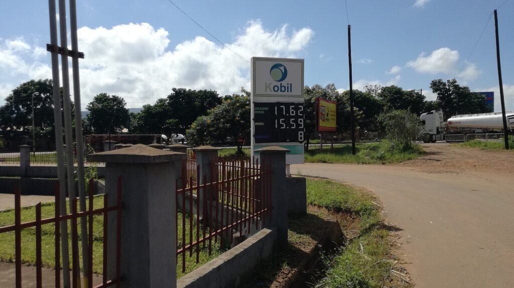 Fuel price sign at a filling station showing petrol and diesel prices