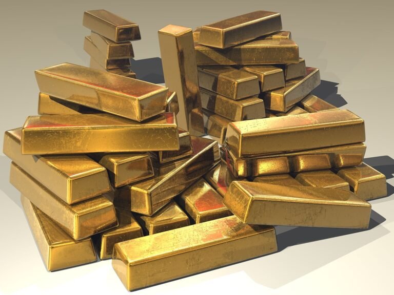 Stacked gold bullion bars representing gold commodity trading
