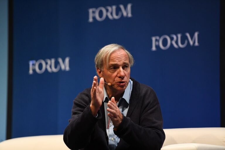 Ray Dalio speaking at Web Summit 2018, identified as Founder and Co-Chief Investment Officer of Bridgewater Associates
